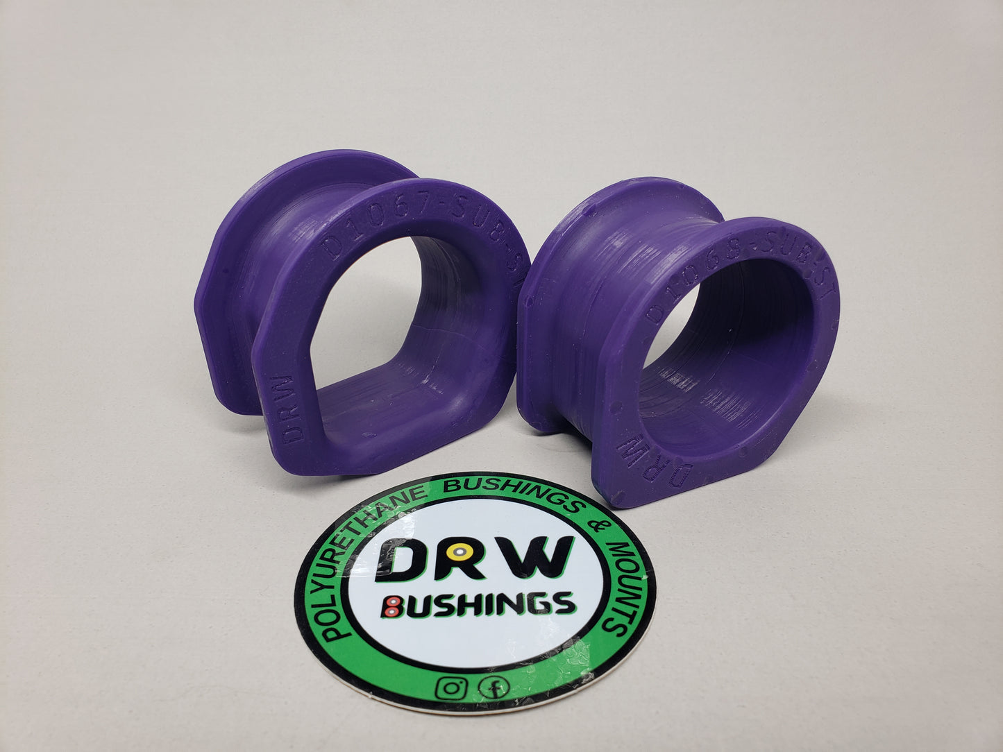 Subaru SVX Steering Rack Mount Bushings. D1067-SUB-SU and D1068-SUB-ST
