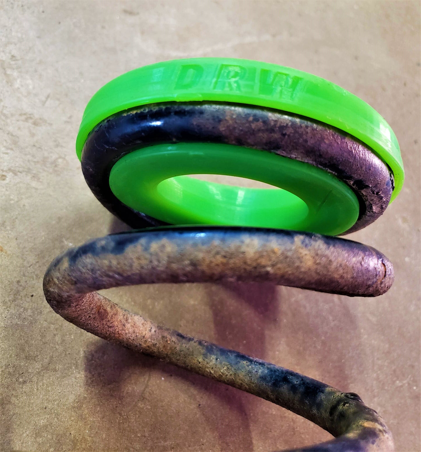 84'-94' Justy Rear Upper Spring Seat/Insulator